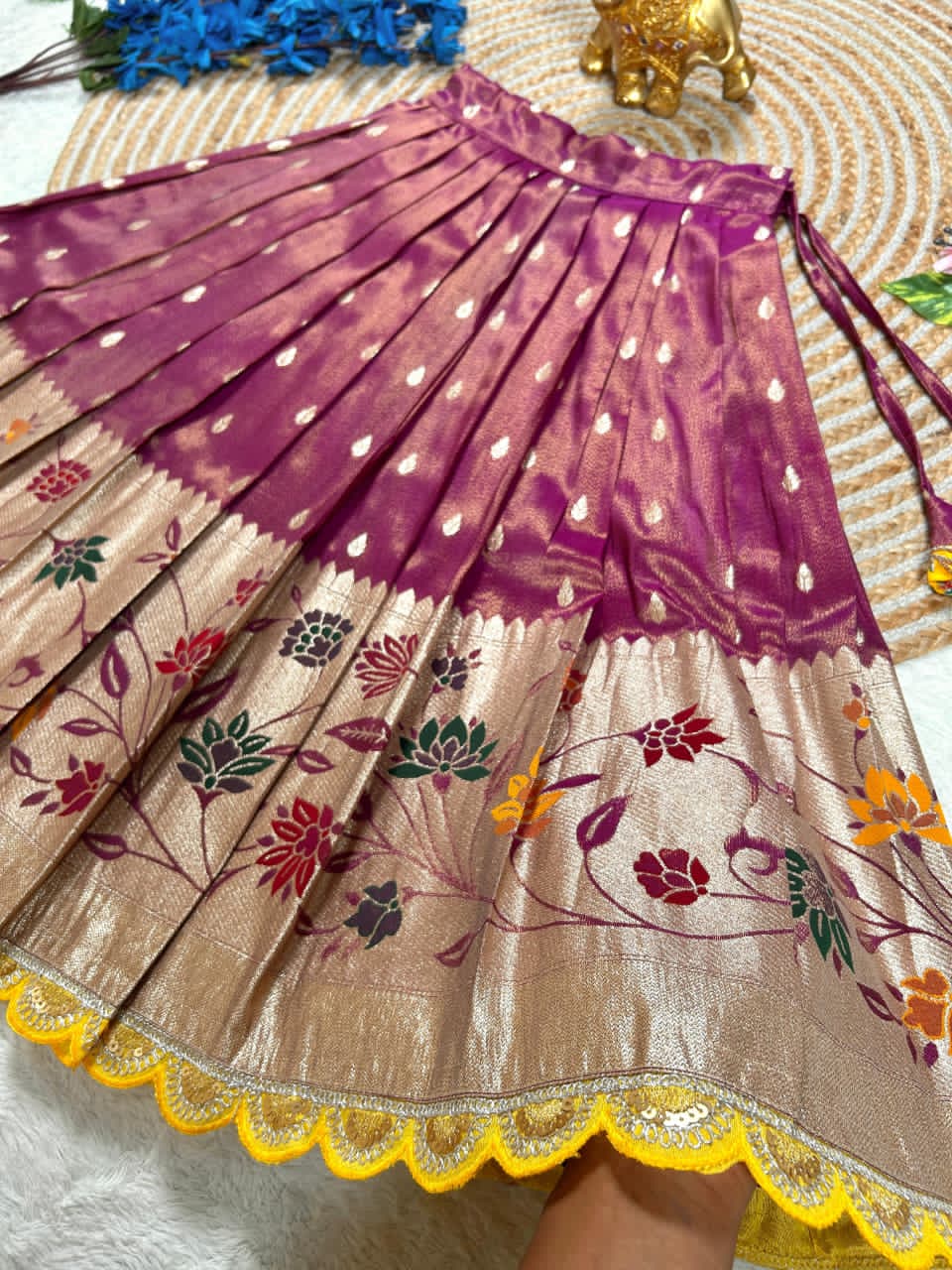 Beautiful Flower Position Work blouse paired with Golden zari Pure Tissue skirt