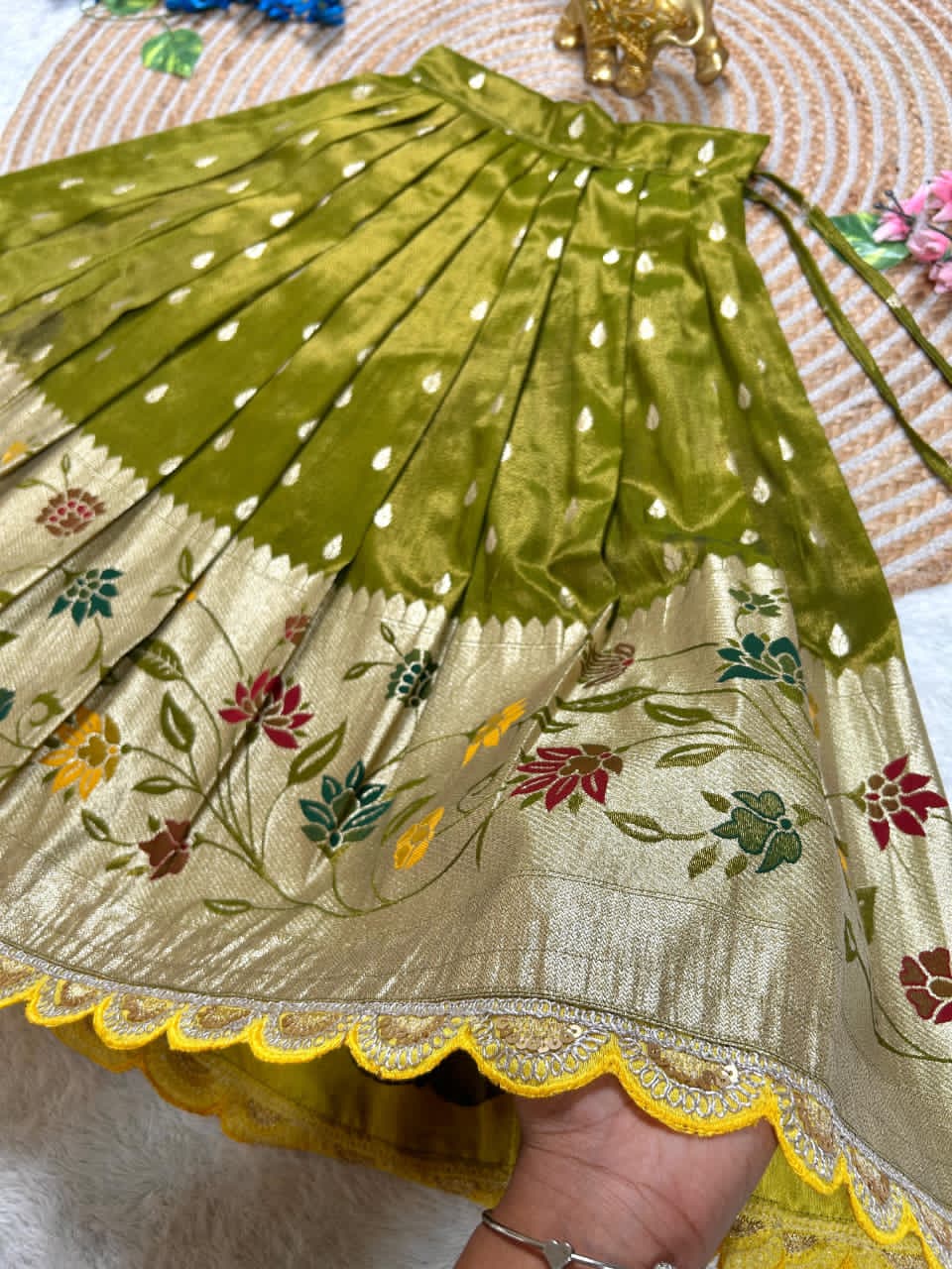 Beautiful Flower Position Work blouse paired with Golden zari Pure Tissue skirt