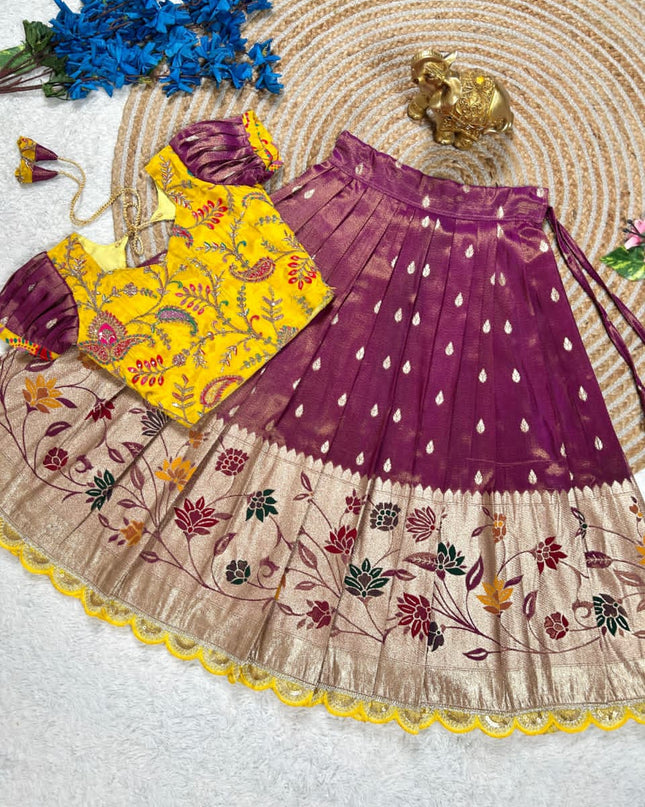 Beautiful Flower Position Work blouse paired with Golden zari Pure Tissue skirt