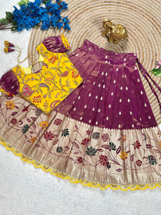 Beautiful Flower Position Work blouse paired with Golden zari Pure Tissue skirt