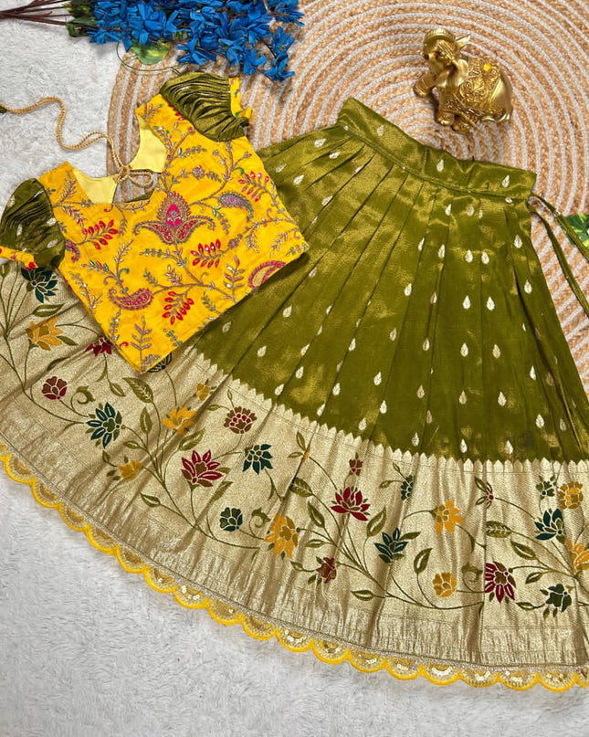 Beautiful Flower Position Work blouse paired with Golden zari Pure Tissue skirt