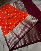 Bright orange body with a maroon