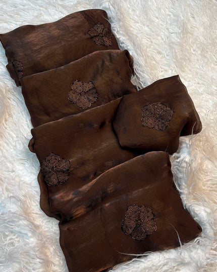brown space fendty saree